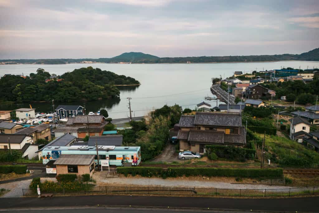 tenhama train line and lake hamanako with views of mountain and ocean