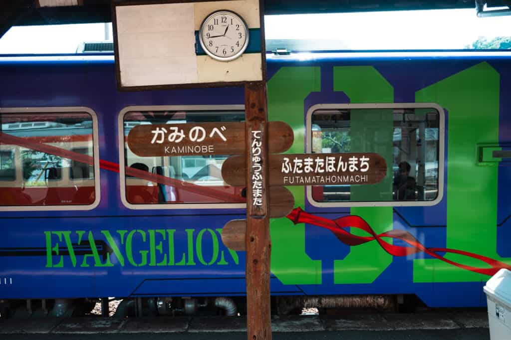 side of evangelion train on tenhama line in japan