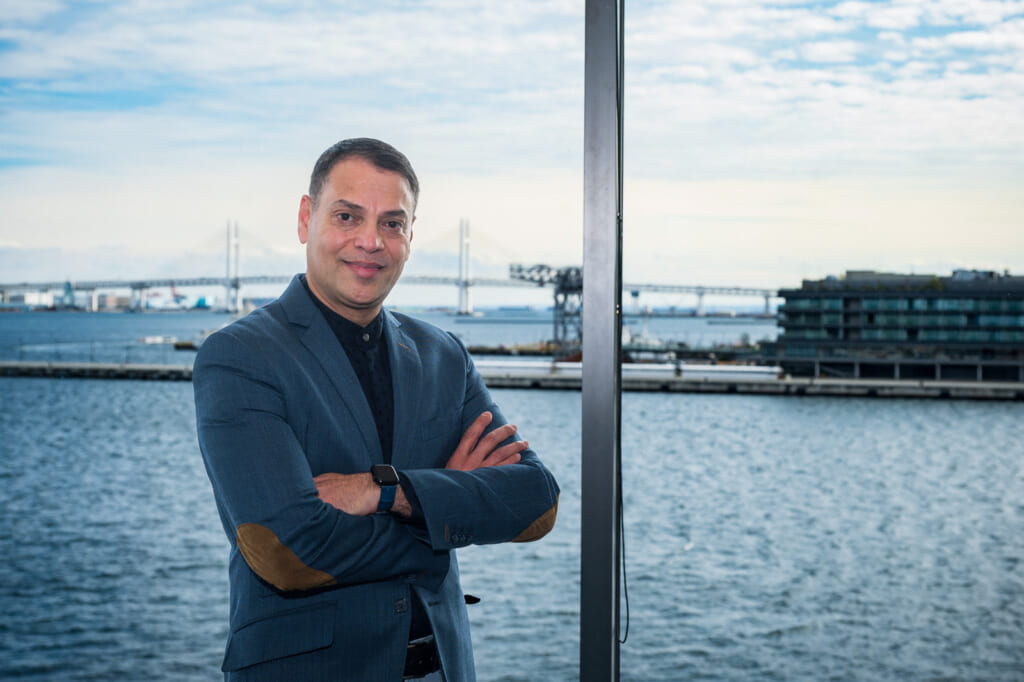 Robert Heldt, CEO of Custom Media pictured in front of Yokohama Bay.