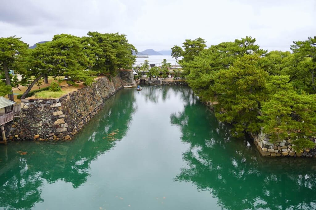 South view of moat from Takamatsu Castle ruins