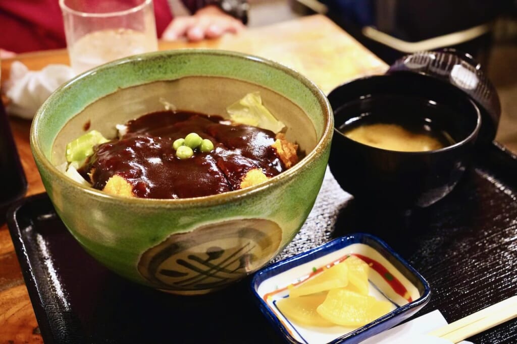 bowl of katsudon with Nomura house demi-glace sauce, tsukemono, miso soup