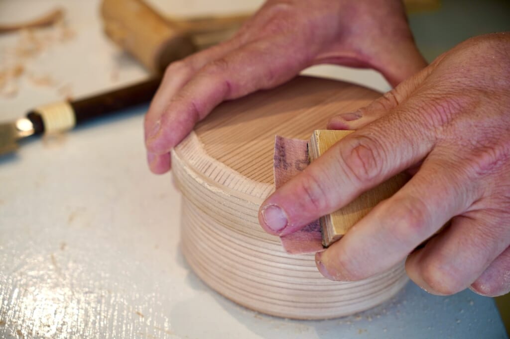 Odate magewappa workshop, sanding down Akita cedar wood cover
