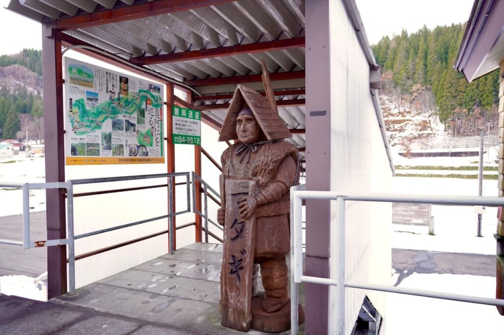 Matagi wooden statue at Ani-Matagi station in Akita