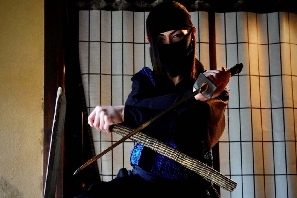 Ninja staff at Iga-ryu museum holding sword and hilt