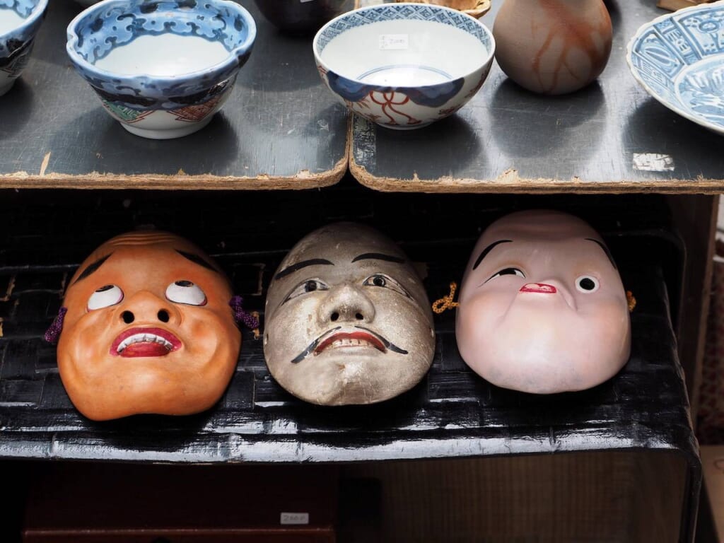 Japanese traditional masks on sale at a Japanese flea market
