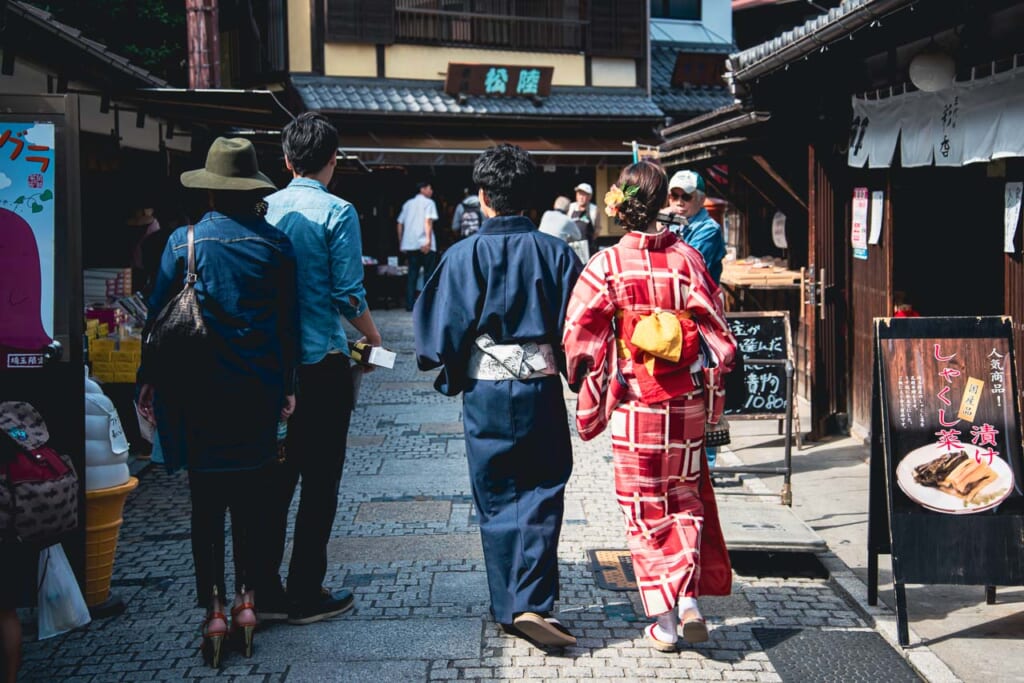 a couple in kimono walking in Kawagoe Kashiya Yokocho