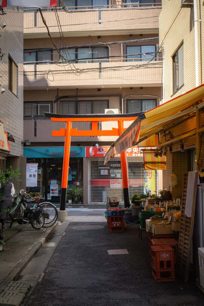 A torii next to a grocery store in Nishi-Ogikubo