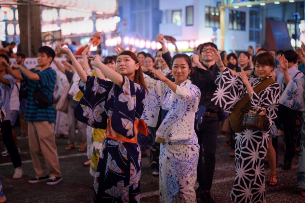 Females dressed in yukata, joining bon odori