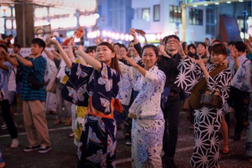 Females dressed in yukata, joining bon odori