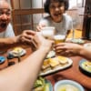 toasting with beer with japanese family in ojika nagasaki