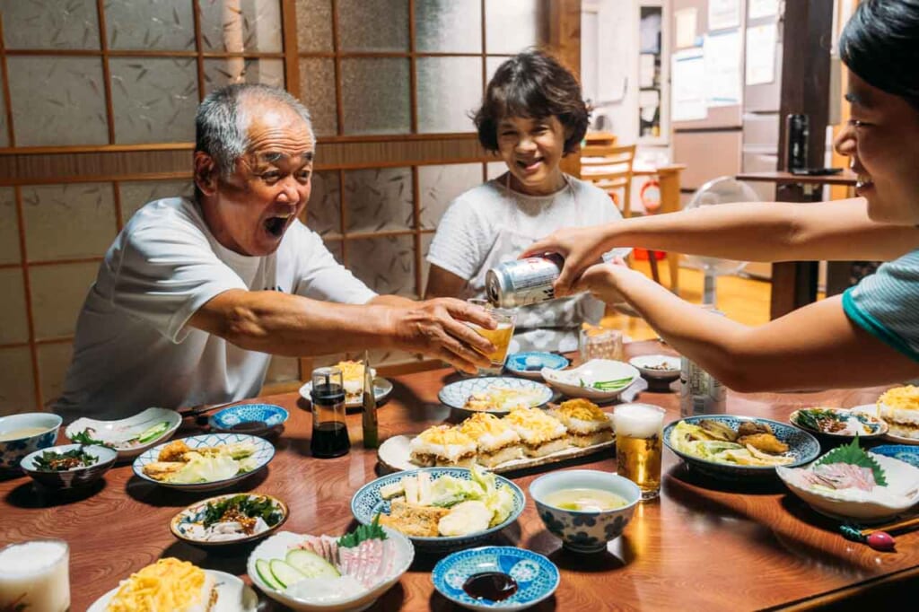 enjoying a home cooked meal with locals on ojika island nagasaki japan