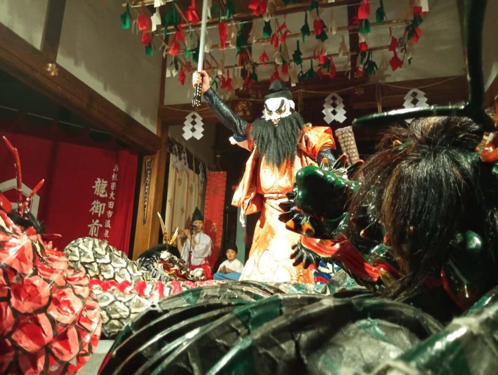 performance of a dragon on a kagura theater in Shimane prefecture