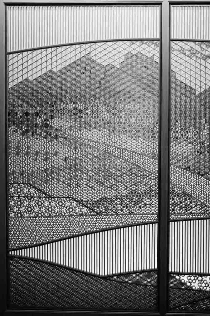 Intricate woodwork screen on display at Takenaka Carpentry Tools Museum in Kobe Japan