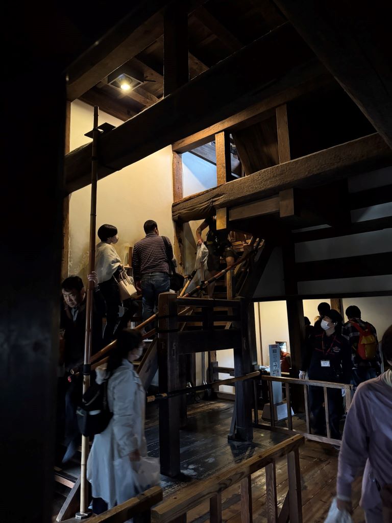 Visitors inside Matsumoto Castle