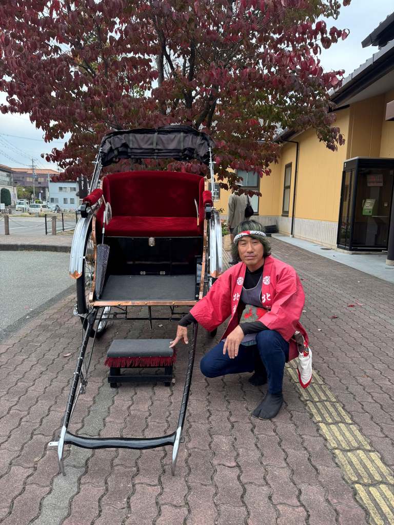 Rickshaw guide in Obuse Town