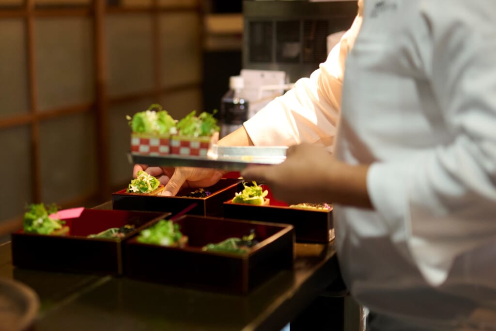 person preparing dinner at Hotel The Mitsui Kyoto