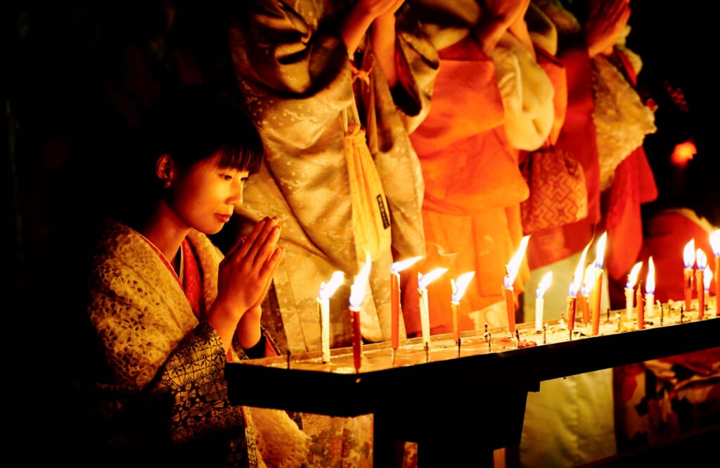 female praying at Santera Mairi Festival, events japan january