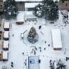 Xmas tree and shops below Sapporo TV Tower at at Sapporo Snow Festival (Yuki Matsuri)