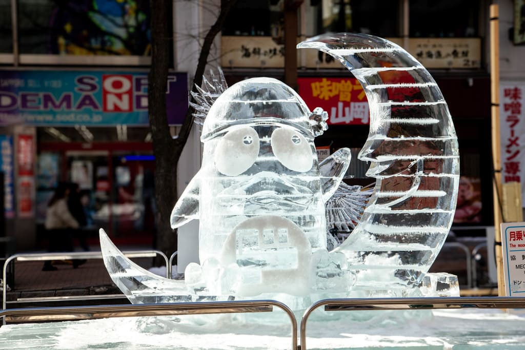 Ice sculpture of chain discount shop Don Quijote mascot in Susukino site at Sapporo Snow Festival (Yuki Matsuri)