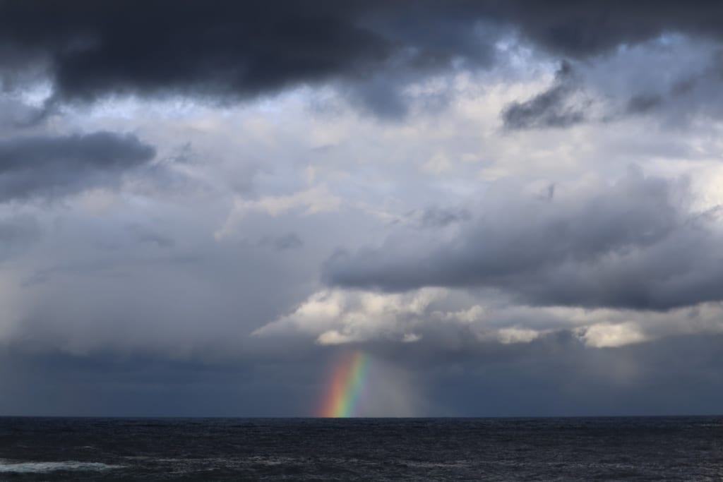 arc-en-ciel sur la mer du japon à proximité de kinosaki onsen